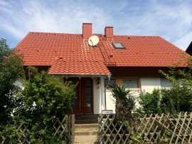 Dachsanierung mit Tonziegel rot engobiert